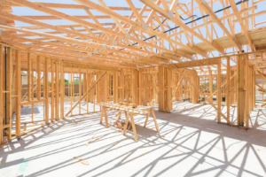 interior wood frame construction site exposed timber framing temporary fire alarm systems during construction