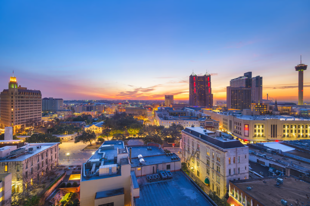 Downtown San Antonio skyline at dusk, the city that hosted Frost Bank Center for the 2026 NBA Finals